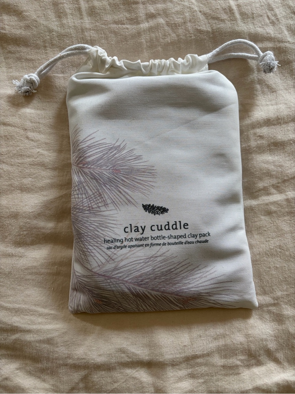 NWOT Saje Clay Cuddle Healing Hot Water Bottle